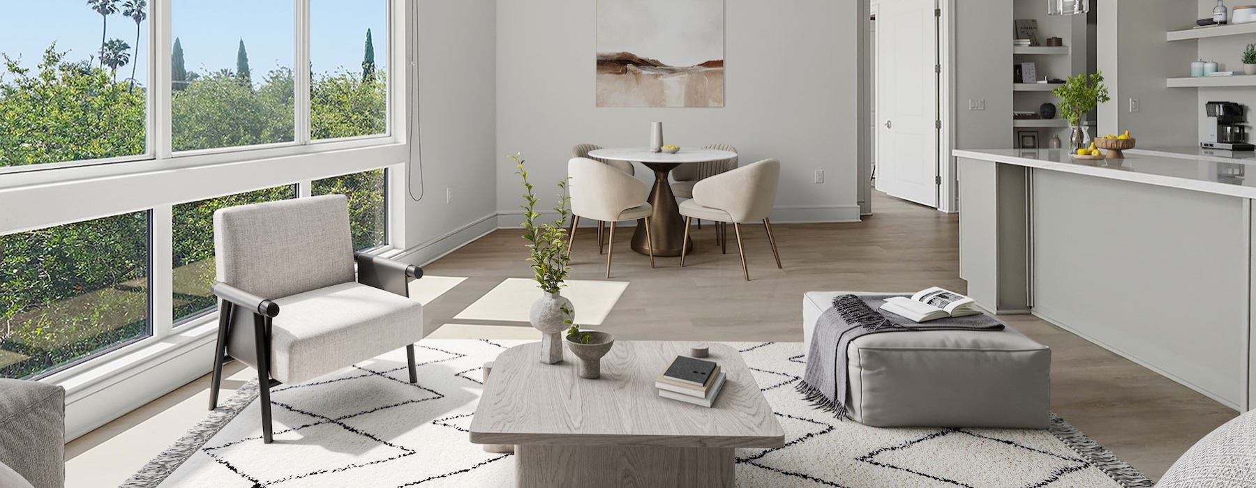 a living room with tables and chairs