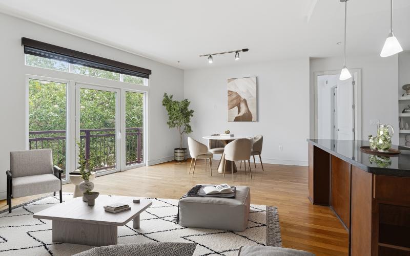 a living room with tables and chairs